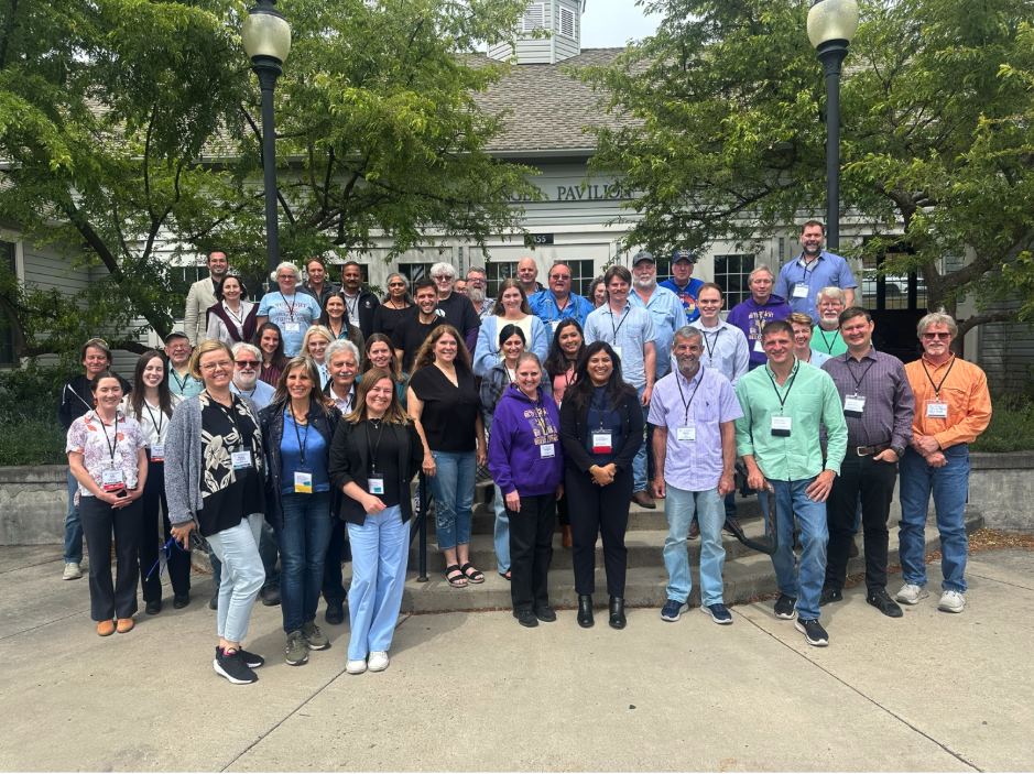 Conference attendees and WSU Bee Program team members in front of the Ensminger Pavilion during the 2026 Local COLOSS North America Conference in Pullman, WA (June 6-9, 2026).